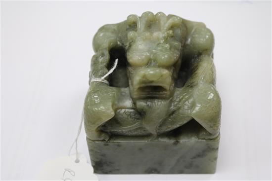 A Chinese green stone dragon seal, 3.25in. (8.3cm)